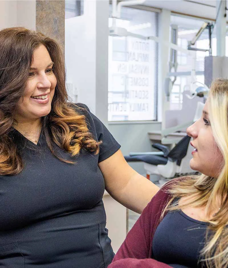 Maple Ridge Smiles Dental team talking with a patient